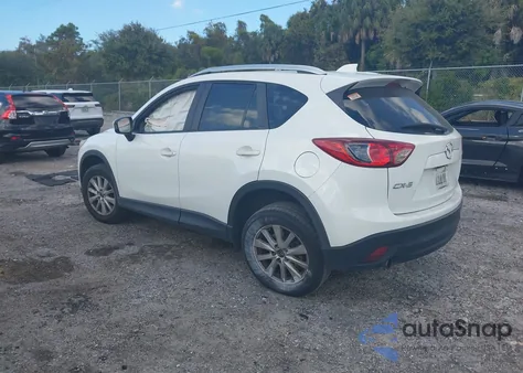 2014 Mazda Cx-5 Touring from USA, damaged, VIN JM3KE2CY7E0409232